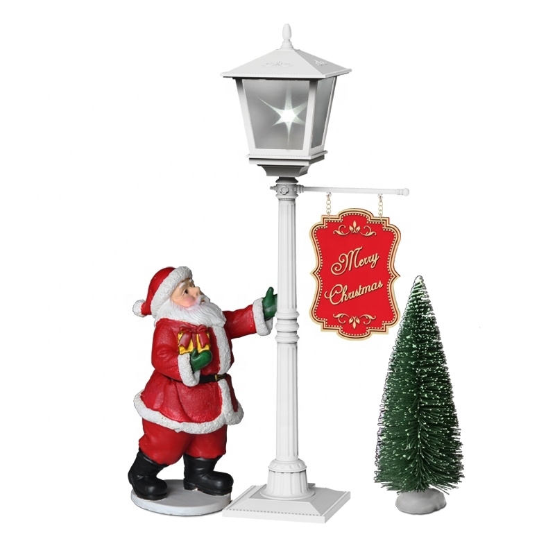 Figura de Natal Papai Noel e árvore com neve, luz e música